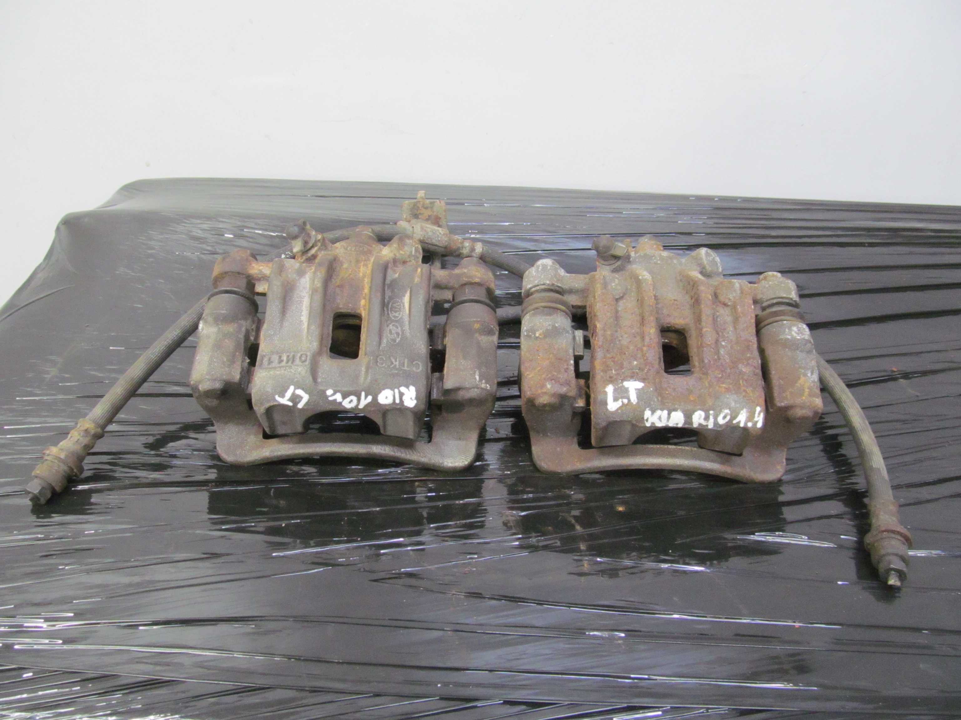 KIA RIO II 05-10 ZACISK HAMULCOWY LEWY TYL