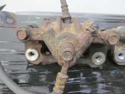 KIA RIO II 05-10 ZACISK HAMULCOWY LEWY TYL