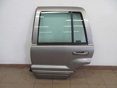 JEEP GRAND CHEROKEE WJ DRZWI TYL LEWE 99-04