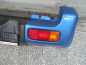 SUZUKI JIMNY ZDERZAK TYL KPL 81A20 LAMPY !! OKAZJA !! 98-05