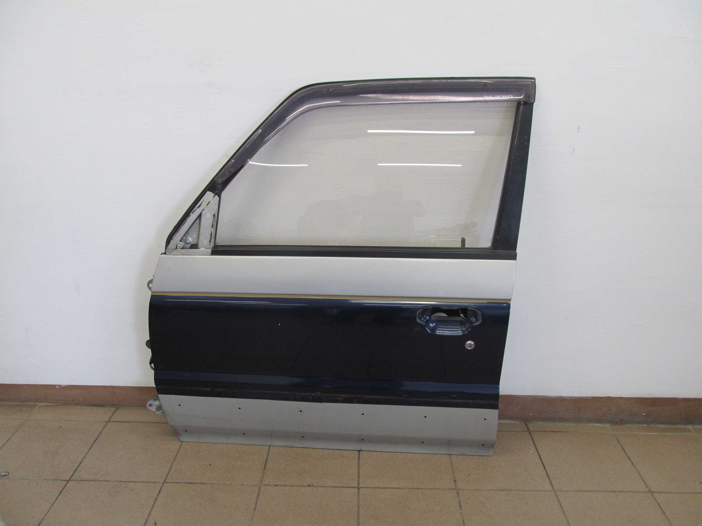 MITSUBISHI PAJERO DRZWI LEWY PRZOD 97-99 KPL
