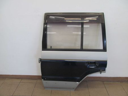 MITSUBISHI PAJERO DRZWI LEWY TYL 97-99 KPL