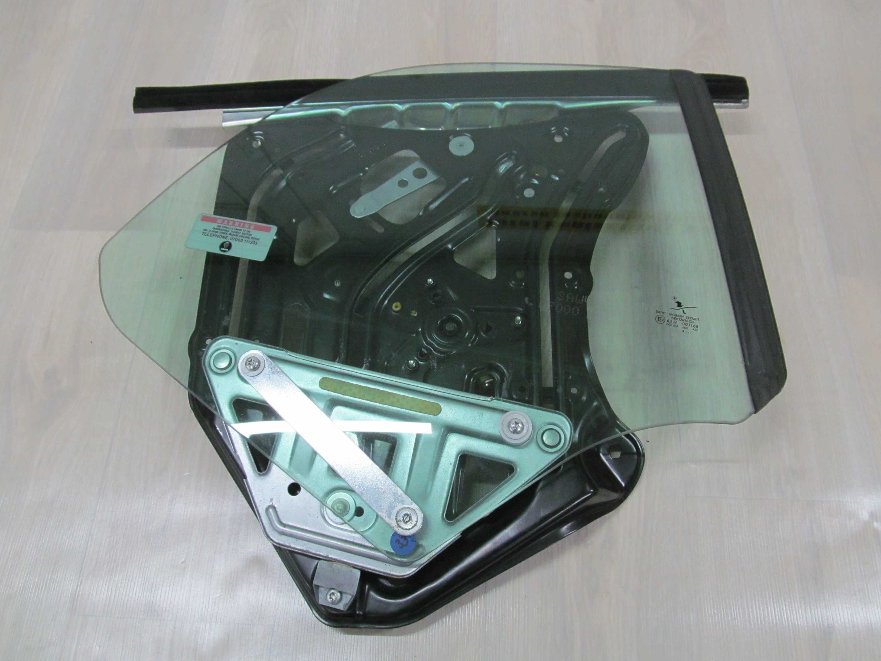 SAAB 9-3 CABRIO MECHANIZM PODNOSNIK SZYBY TYL 04-11
