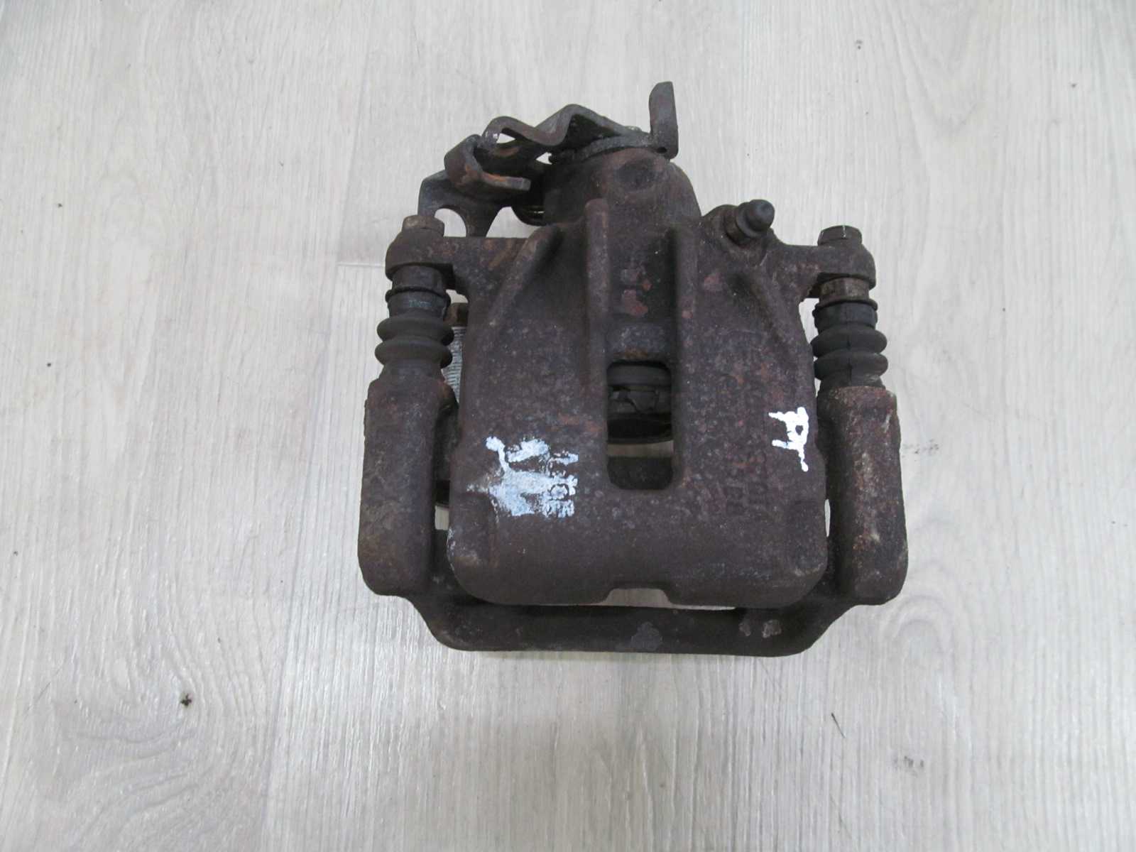 OPEL VIVARO TRAFIC 2.0 DCI 01-14 ZACISK HAMULCOWY TYL PRAWY 837016 61708