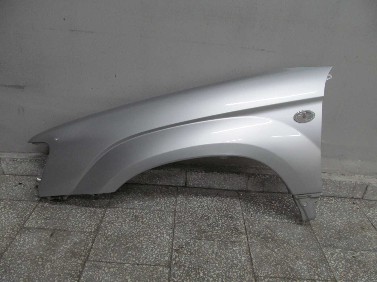SUBARU FORESTER II SG BLOTNIK PRZOD LEWY 2L7 02-05