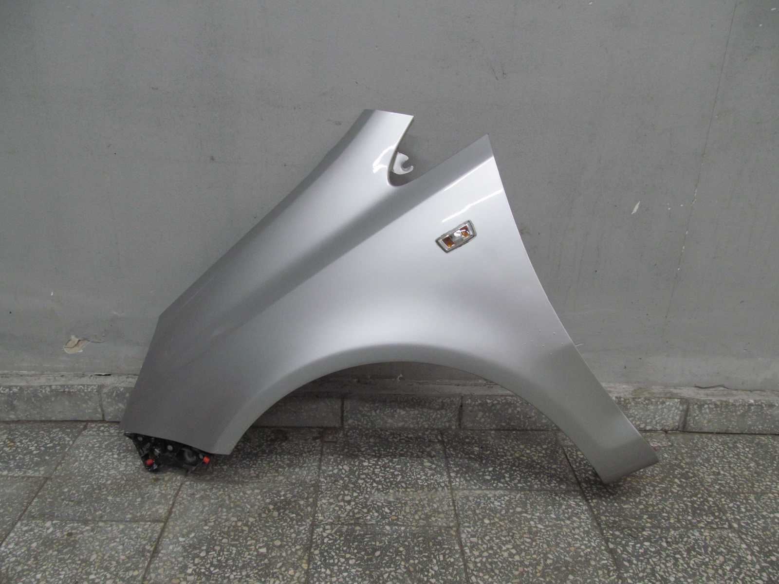 OPEL CORSA D BLOTNIK PRZOD LEWY Z157 KPL 06-11