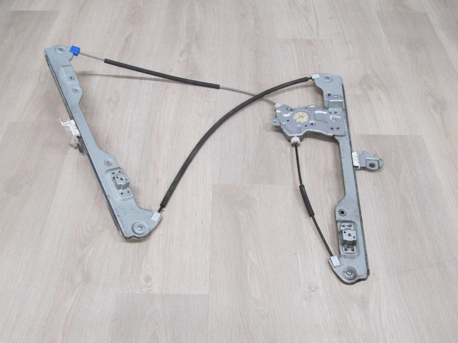 NISSAN CABSTAR MAXITY NT400 MECHANIZM PODNOSNIK SZYB LEWY 07-15