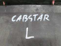 NISSAN CABSTAR MAXITY NT400 NADKOLE OSLONA PRZOD LEWY 50811-MB400 07-15