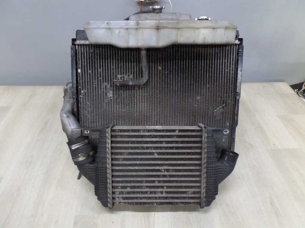 NISSAN CABSTAR MAXITY NT400 2.5 CHLODNICA INTERCOOLER OBUDOWA 14461-MA70A 07-15