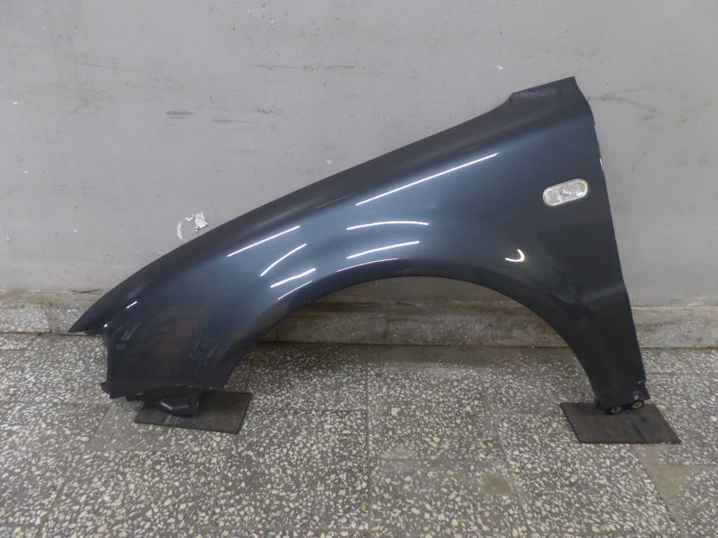 VW PASSAT B5 BLOTNIK LEWY PRZOD 96-00 LC7U