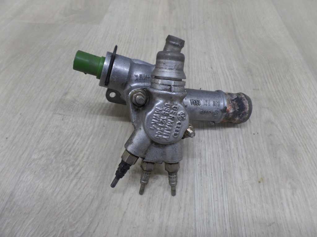 VW PASSAT AUDI A4 1.9TDI KROCIEC PODGRZEWACZ WODY 038121133A 038121145
