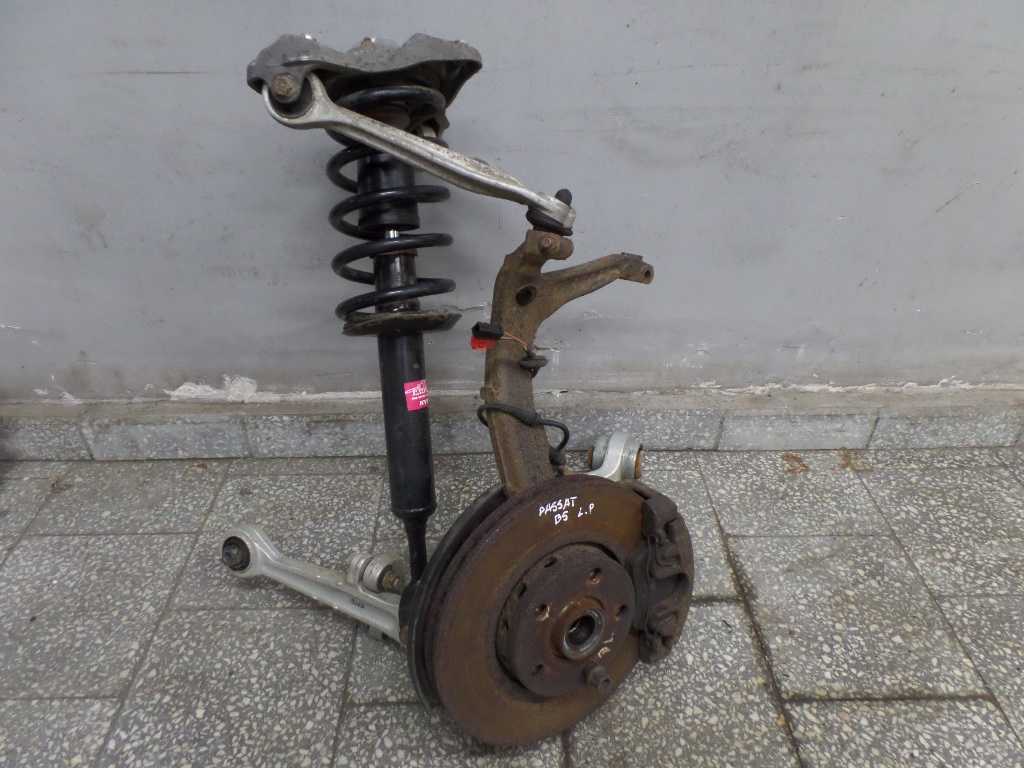 VW PASSAT B5 1.9TDI ZWROTNICA MCPHERSON ZACISK AMORTYZATOR KPL LEWA