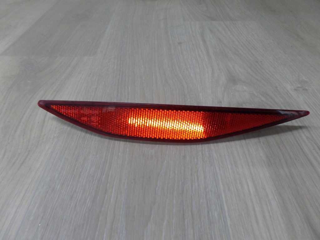 VW GOLF VII 12-20 ODBLASK ZDERZAKA TYL LEWY 5G0945105