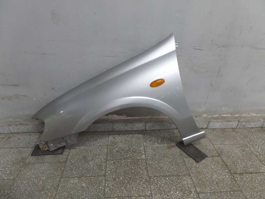 NISSAN ALMERA N16 LIFT 00-06 BLOTNIK PRZOD LEWY KY0