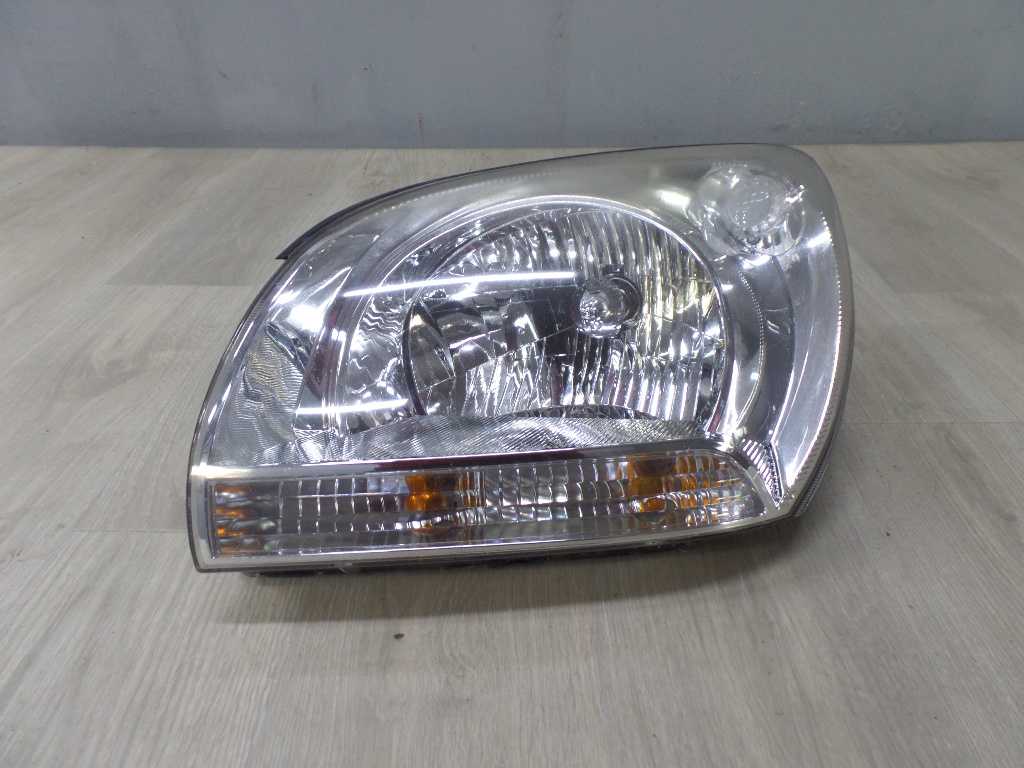 KIA SPORTAGE II 04-10 LAMPA PRZOD LEWA UK 92101-1F0