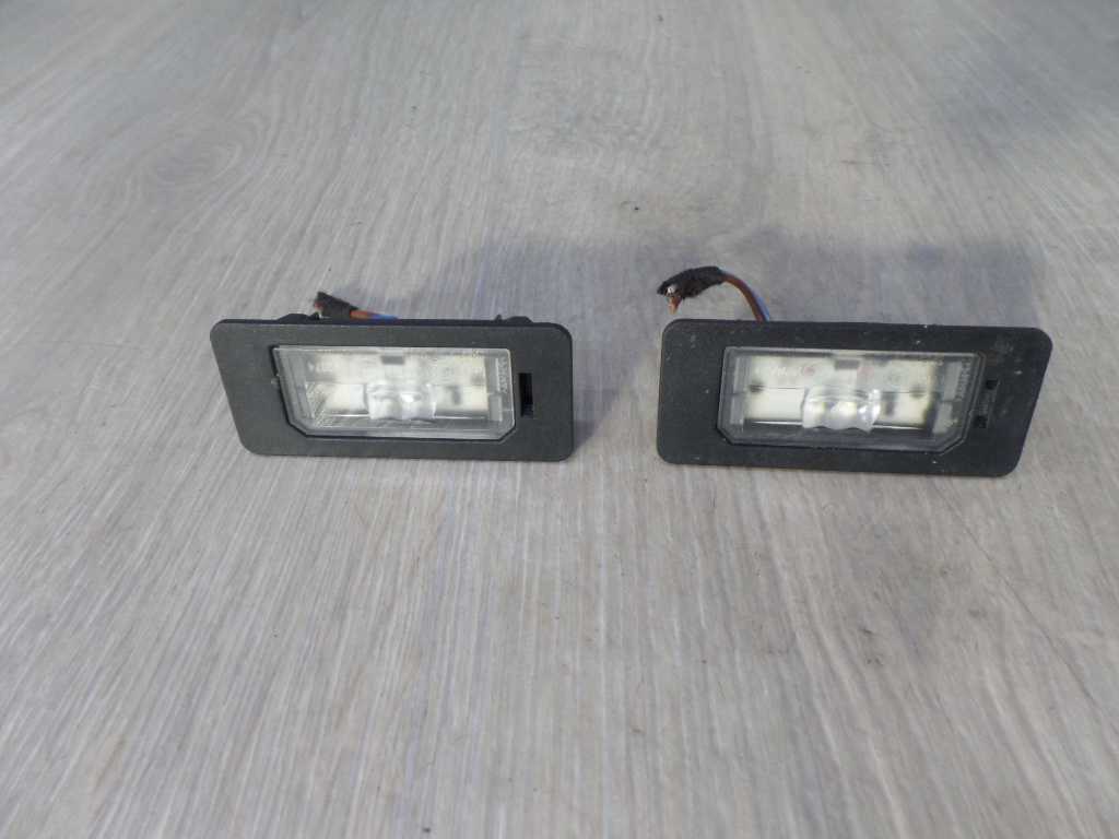 BMW 3 E90 E91 LAMPKA OSWIETLENIA TABLICY REJESTRACYJNEJ 7193293 04-08