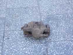 TOYOTA AVENSIS VERSO ZACISK HAMULCOWY TYL LEWY 01-07