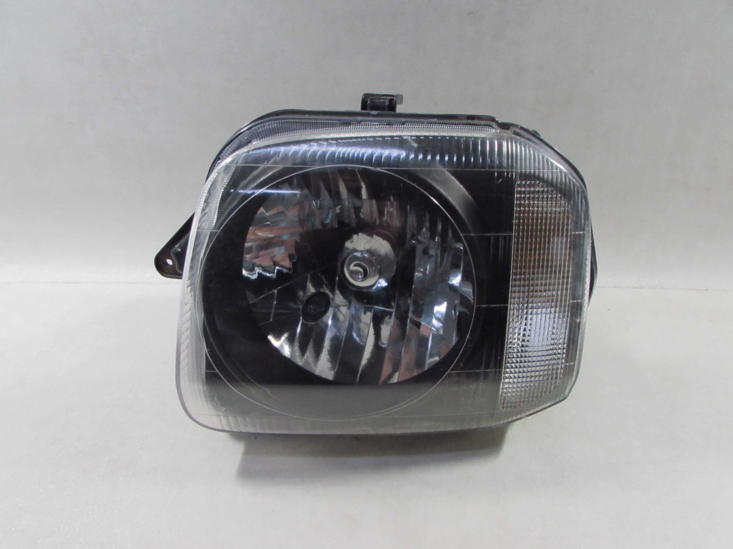 SUZUKI JIMNY 01-12 LAMPA PRZOD LEWA KOITO 100-32081 UK