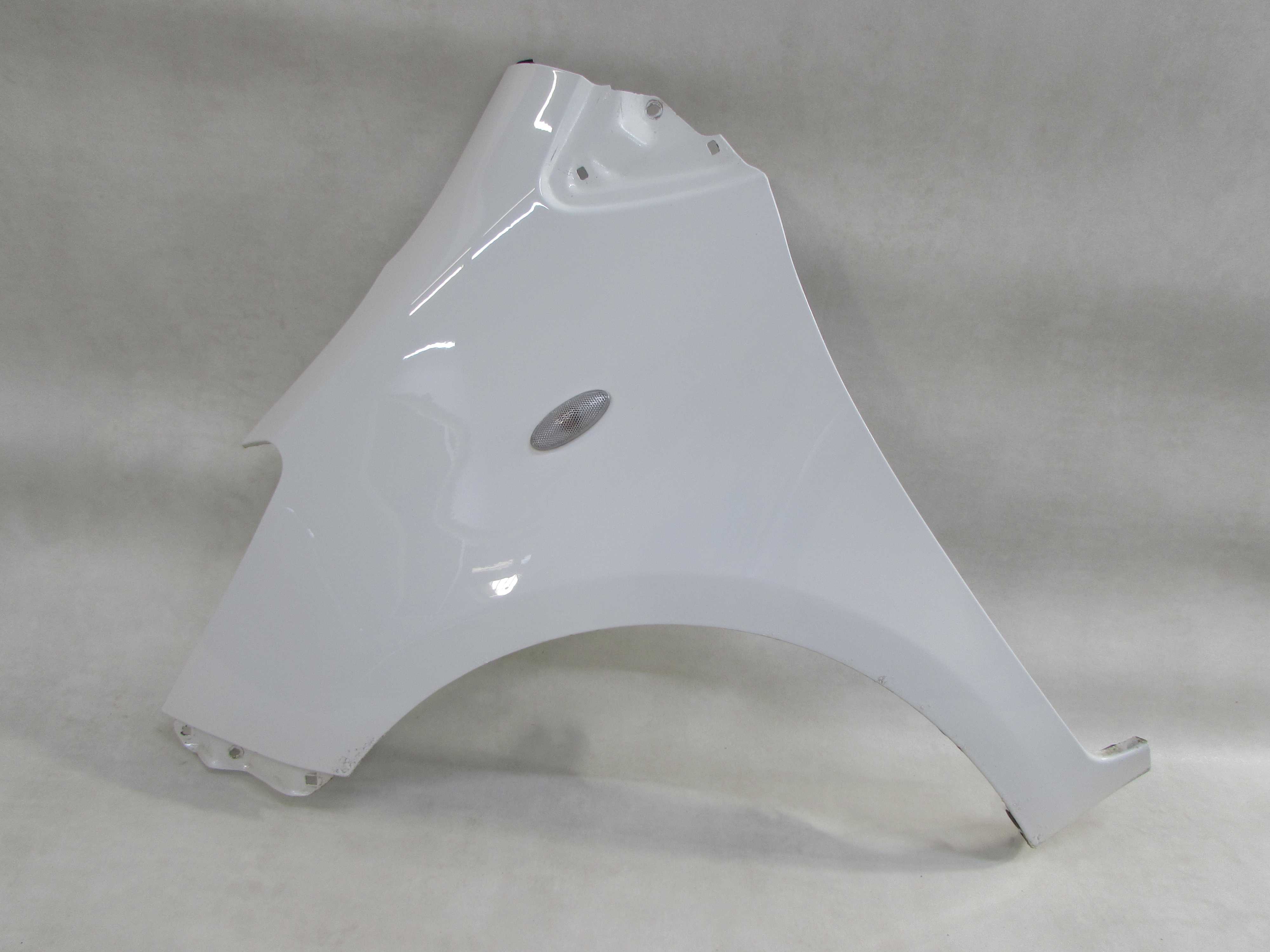 TOYOTA YARIS II LIFT 09-11 BLOTNIK PRZOD LEWY KPL 068