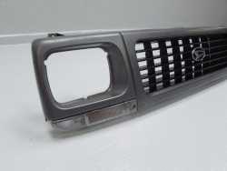 DAIHATSU ROCKY FOURTRACK 93-06 GRILL ATRAPA LAMPY