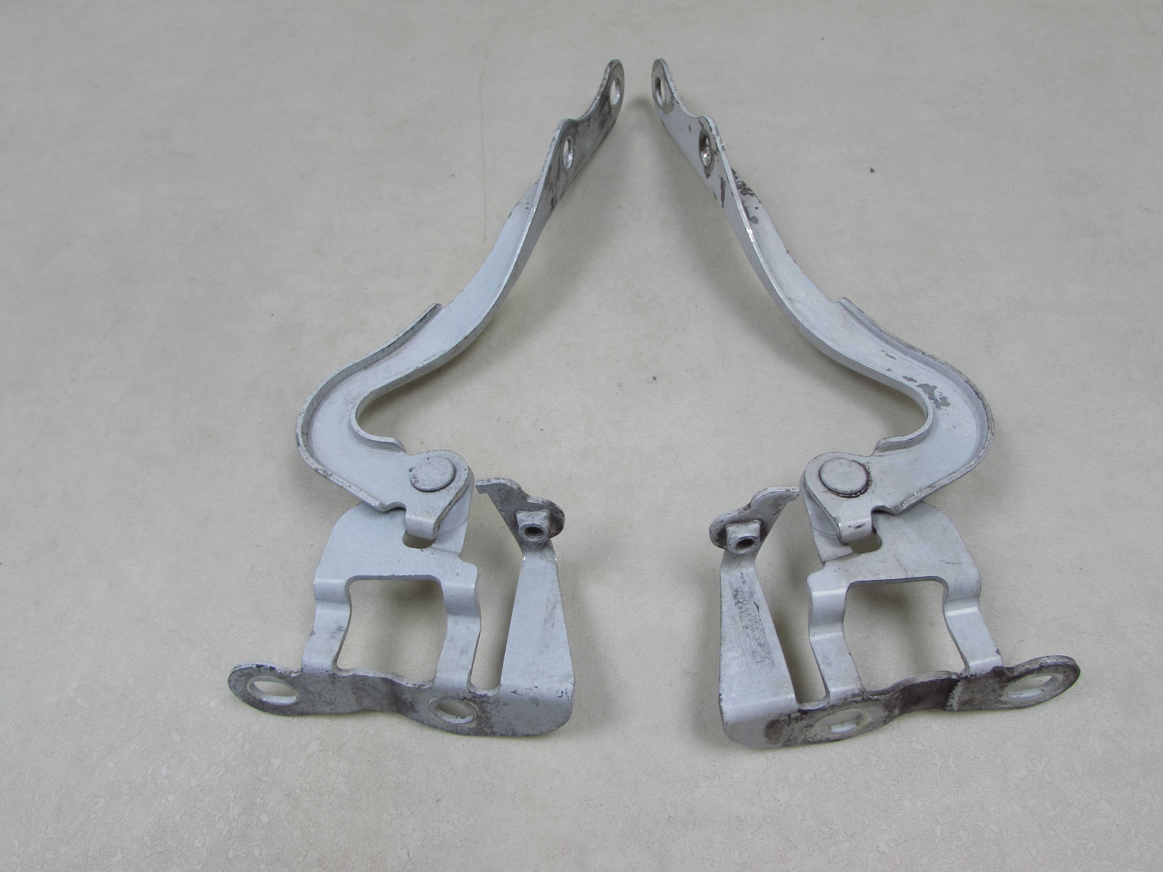 TOYOTA YARIS II LIFT 06-11 ZAWIAS MASKI LEWY PRAWY KPL 068 DO ZALOZENIA