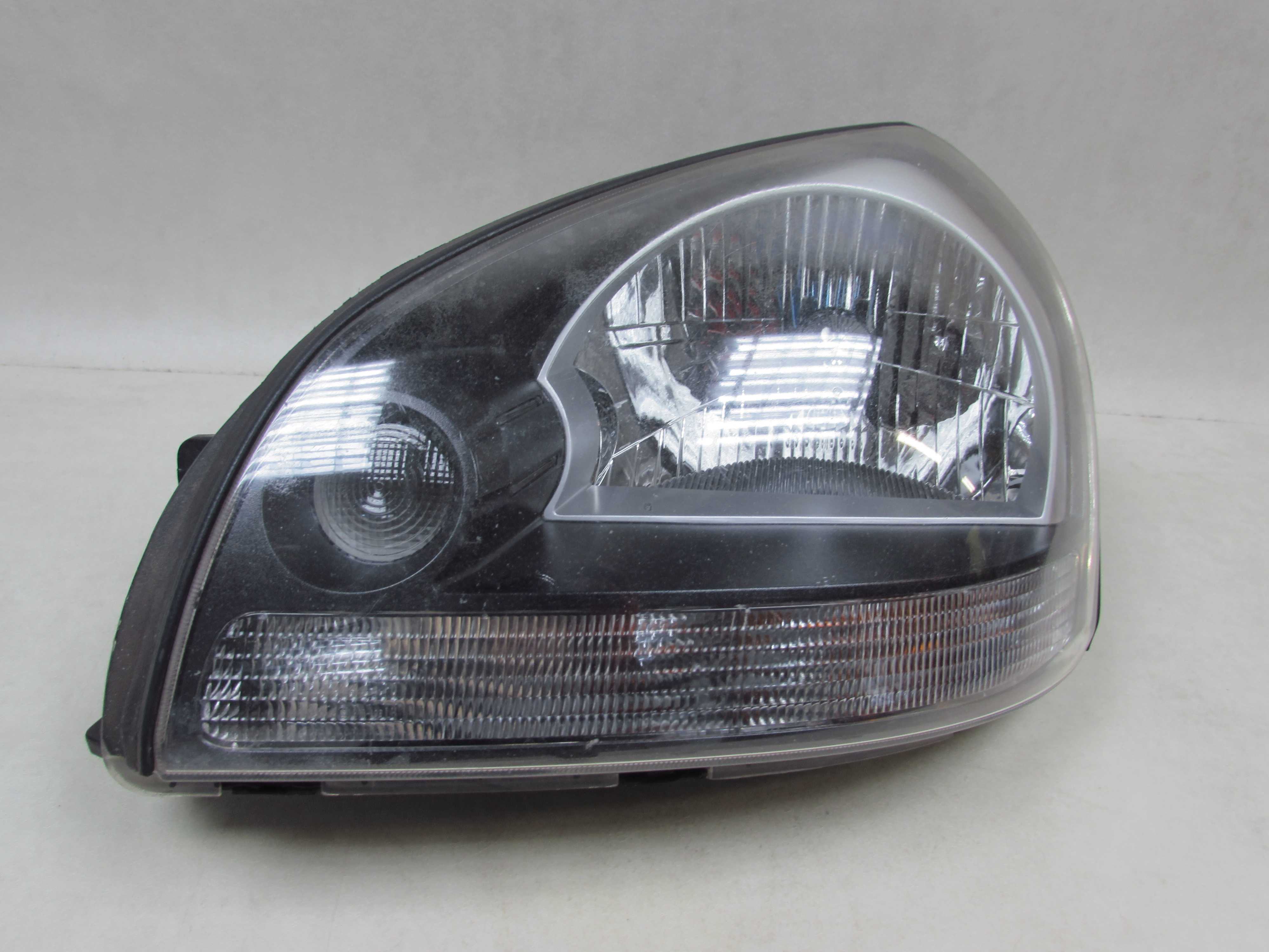 HYUNDAI TUCSON 04-09 LAMPA PRZOD LEWA 92101-2EXXX REFLEKTOR UK