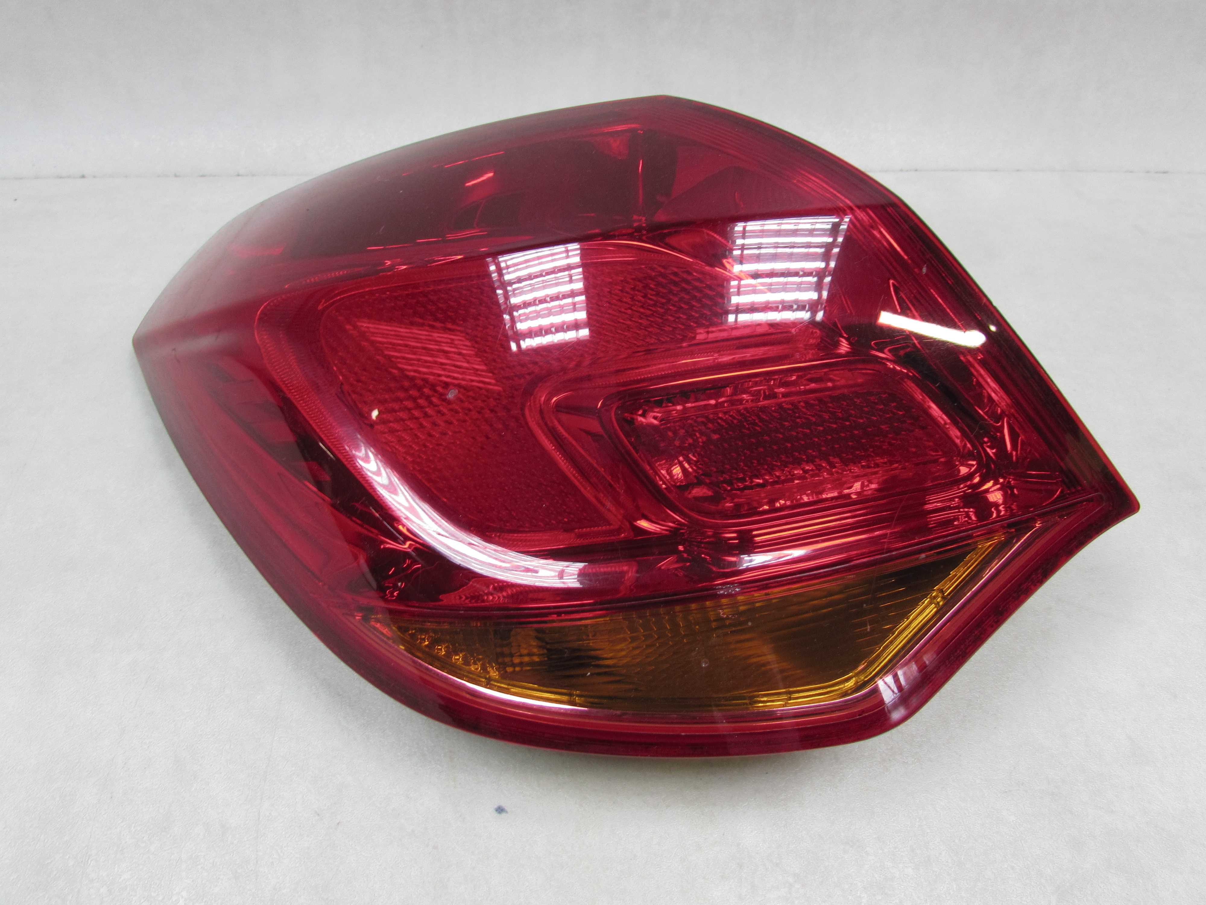 OPEL ASTRA J LIFT FL HB 12-15 LAMPA TYL LEWA