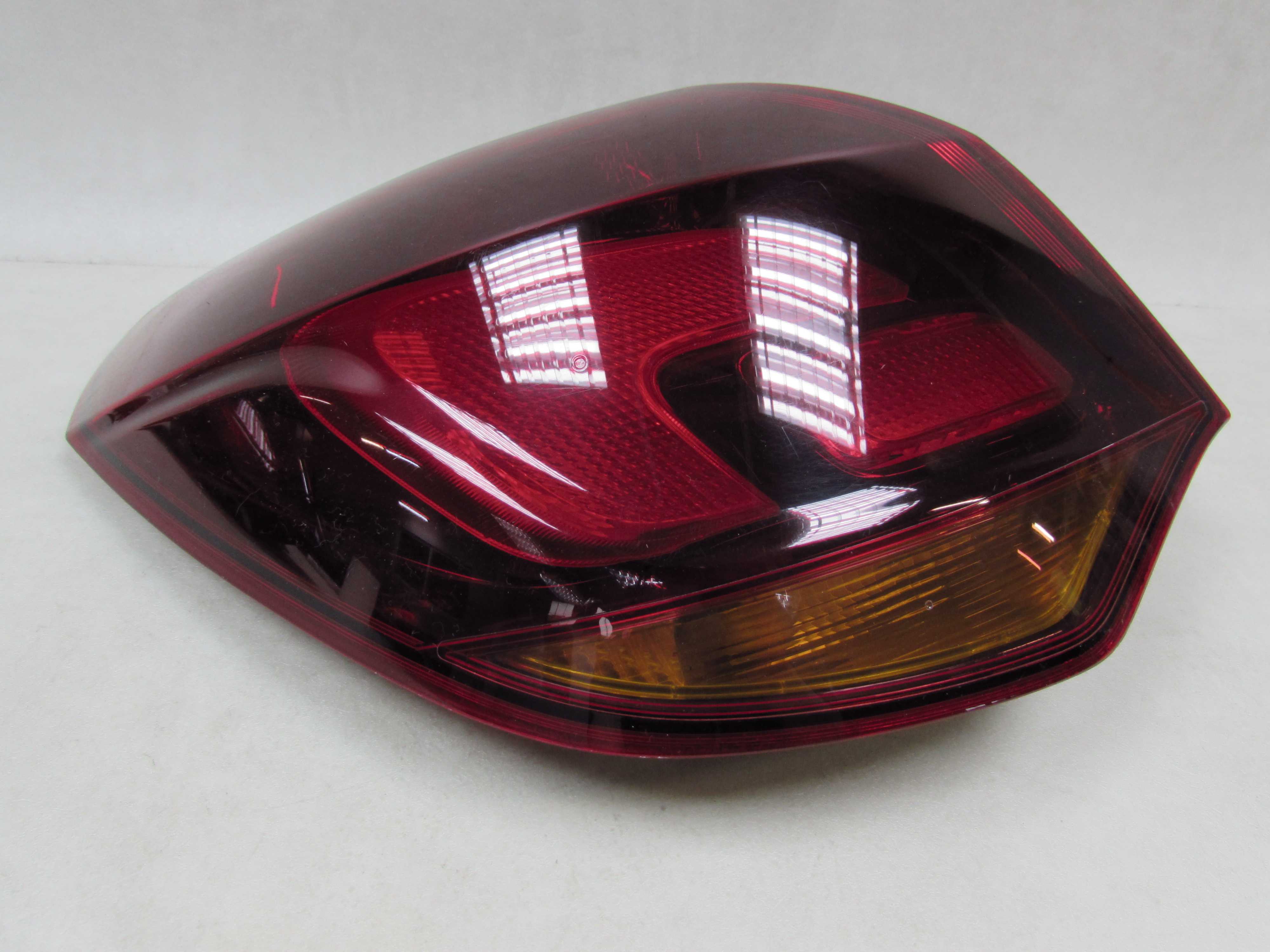 OPEL ASTRA J LIFT FL HB 12-15 LAMPA TYL LEWA CIEMNA
