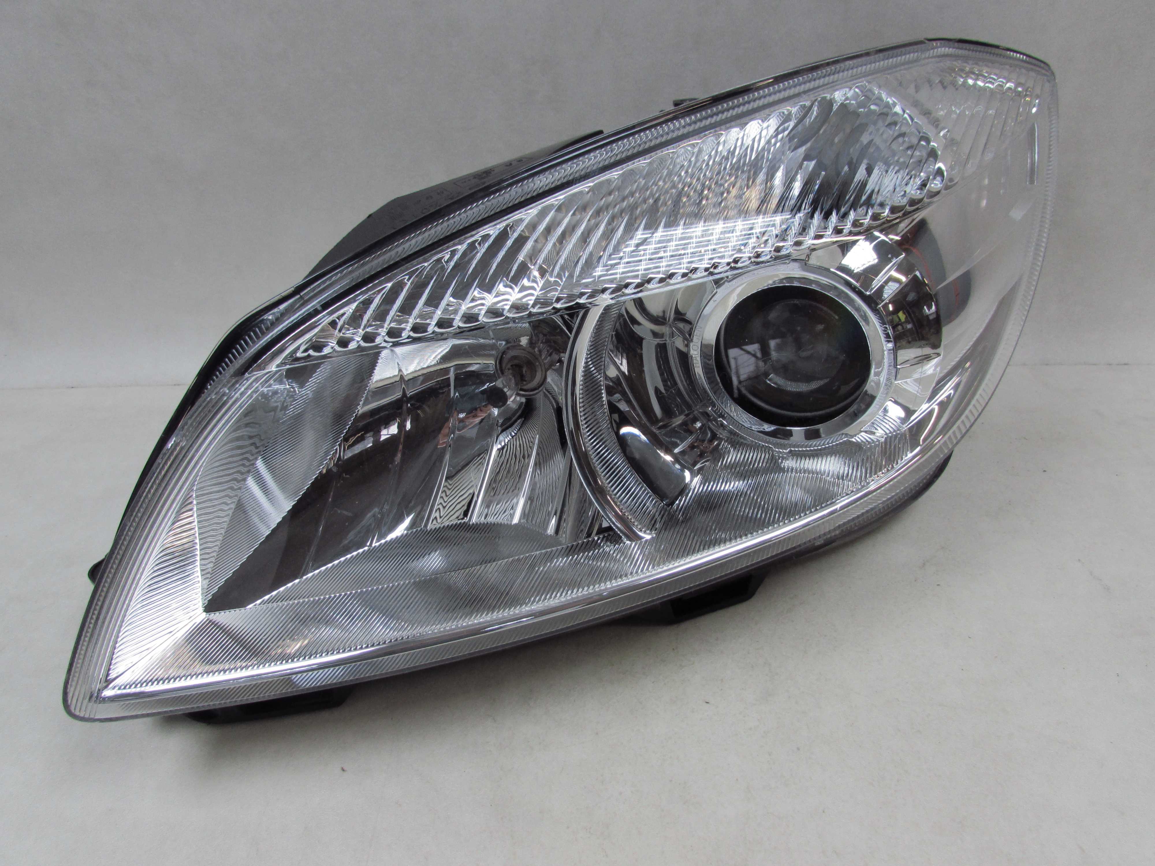 SKODA FABIA II ROOMSTER LAMPA PRZOD LEWA REFLEKTOR 1LL010417 UK 06-15