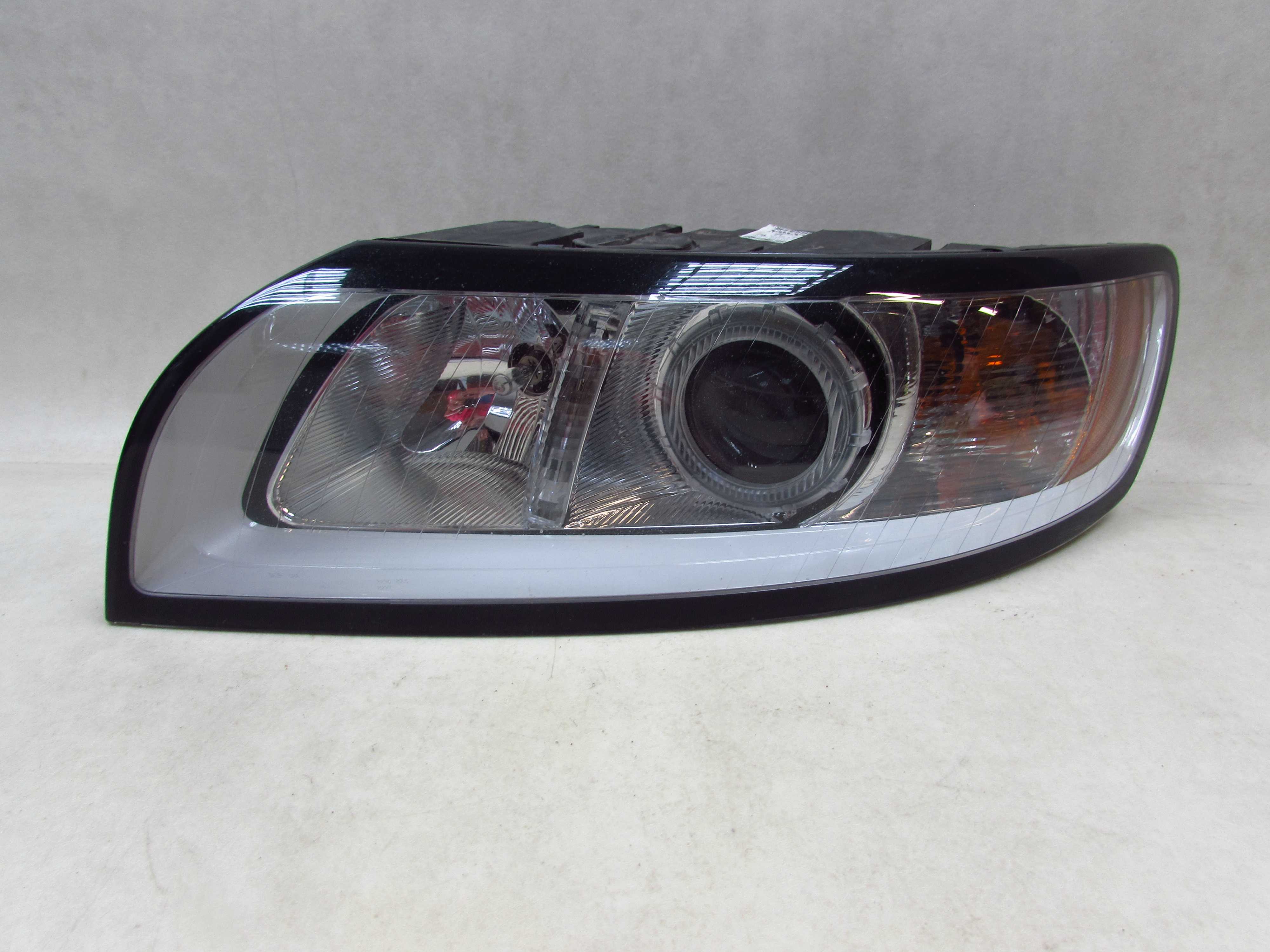 VOLVO S40 V50 LIFT 07-13 LAMPA REFLEKTOR PRZOD LEWA 31299583 EUROPA