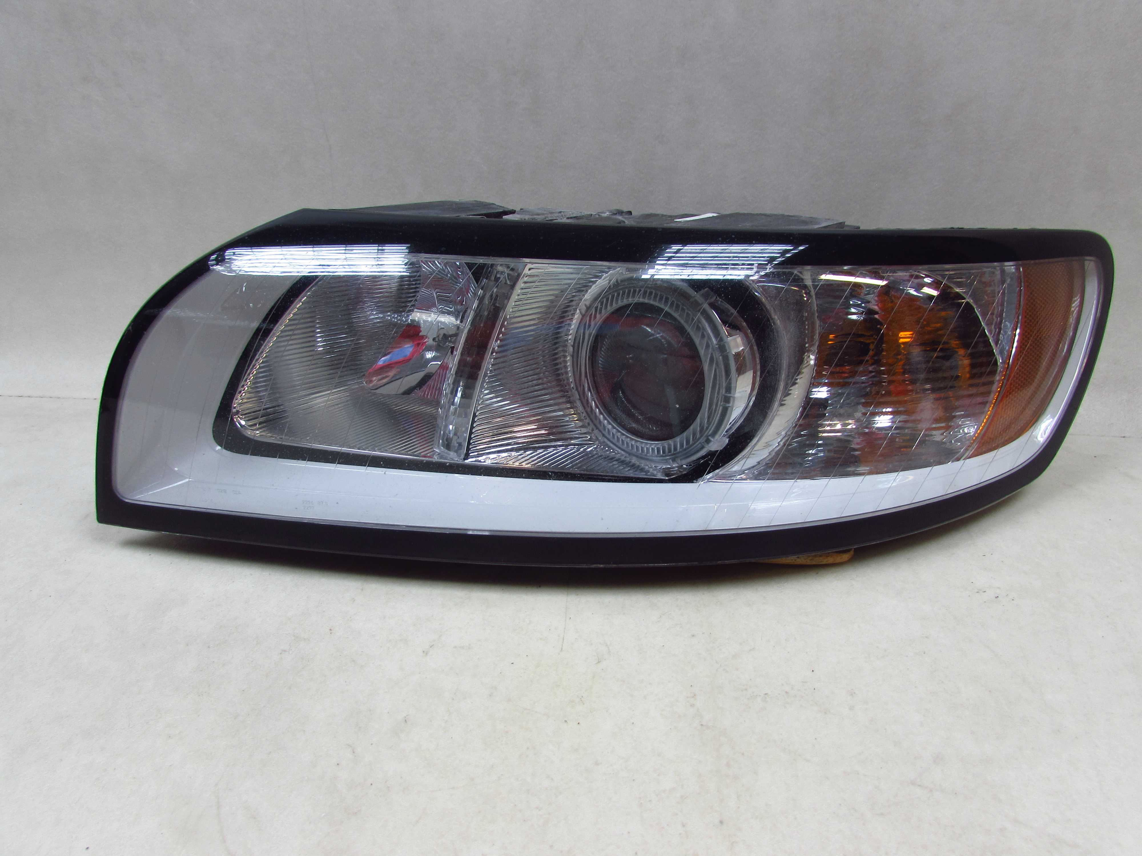 VOLVO S40 V50 LIFT 07-13 LAMPA REFLEKTOR PRZOD LEWA 30763033 EUROPA