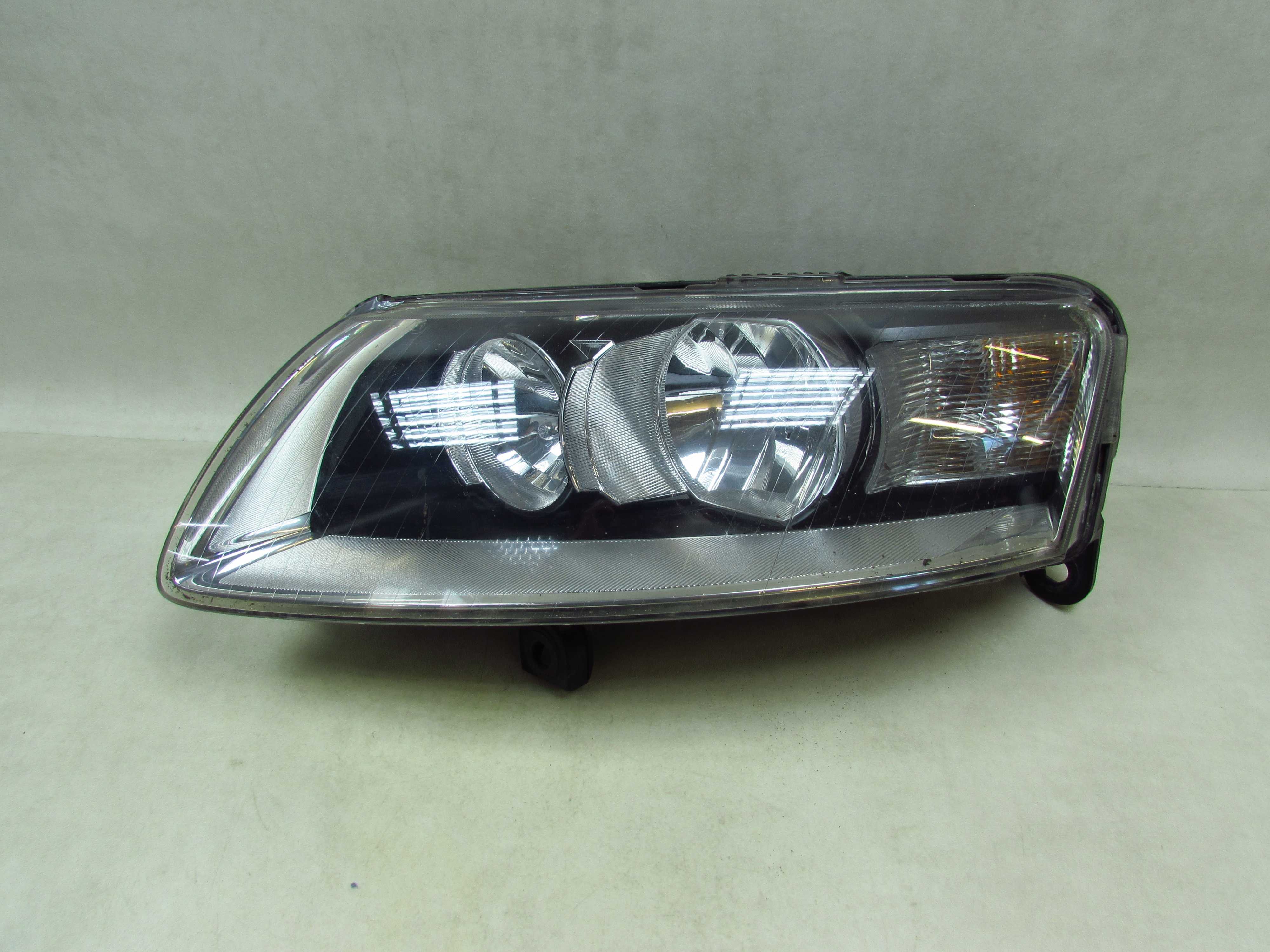 AUDI A6 C6 04-11 LAMPA REFLEKTOR PRZOD LEWA 4F0941003BK UK