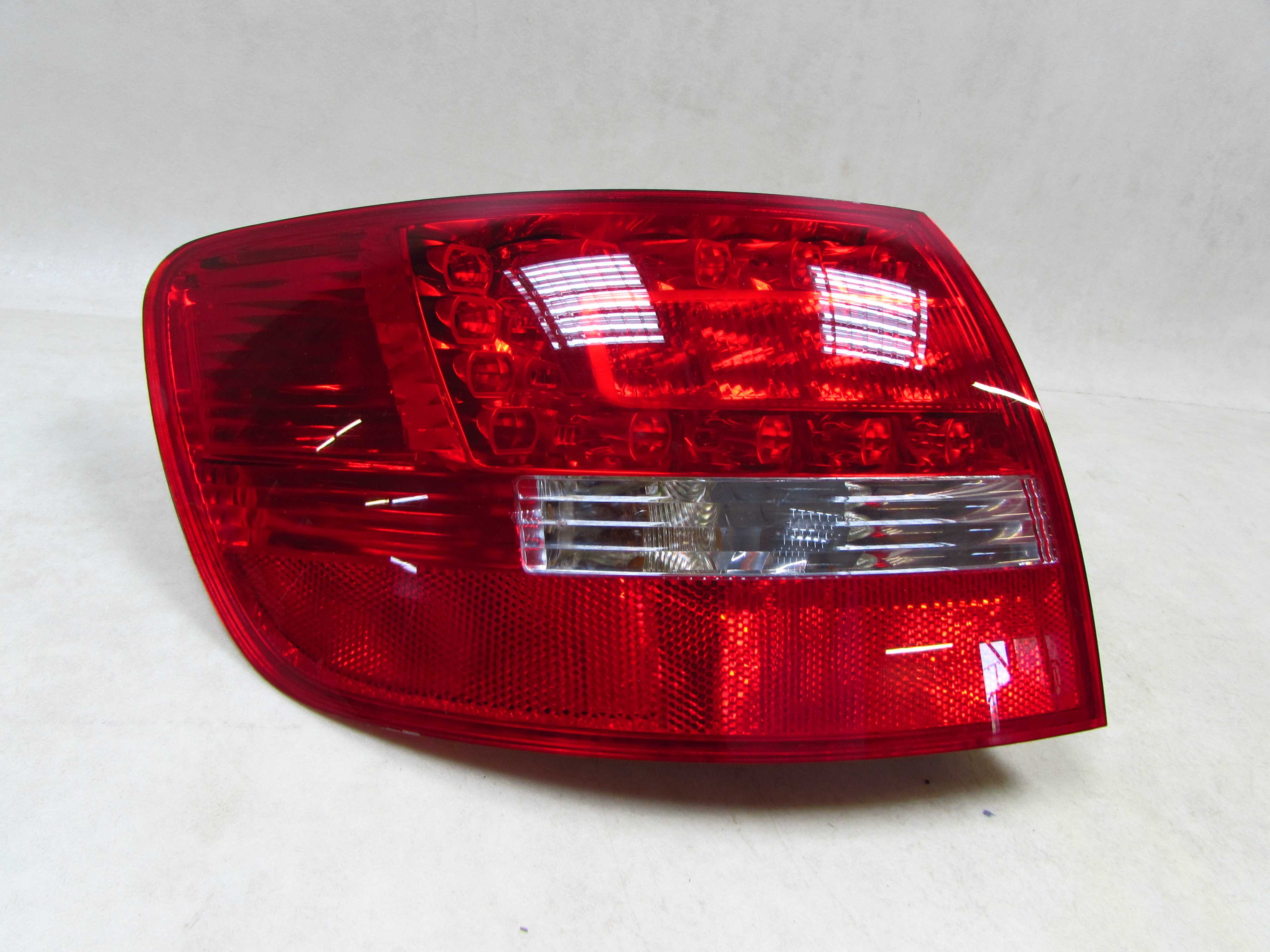 AUDI A6 C6 KOMBI LIFT 09-11 AVANT LAMPA TYL LEWA