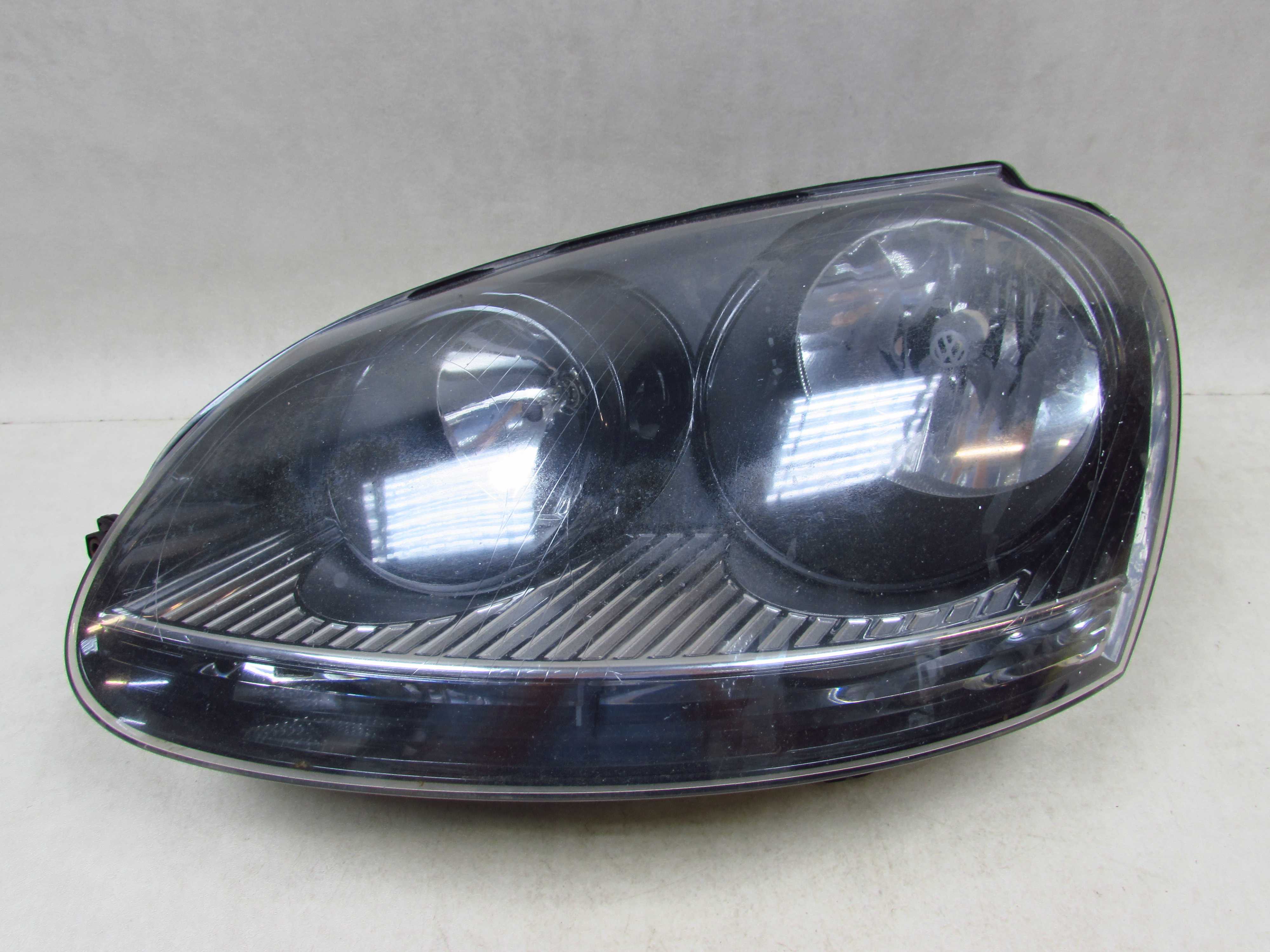 VW JETTA GOLF V KOMBI 03-10 LAMPA PRZOD LEWA REFLEKTOR CIEMNY UK 1K6941005