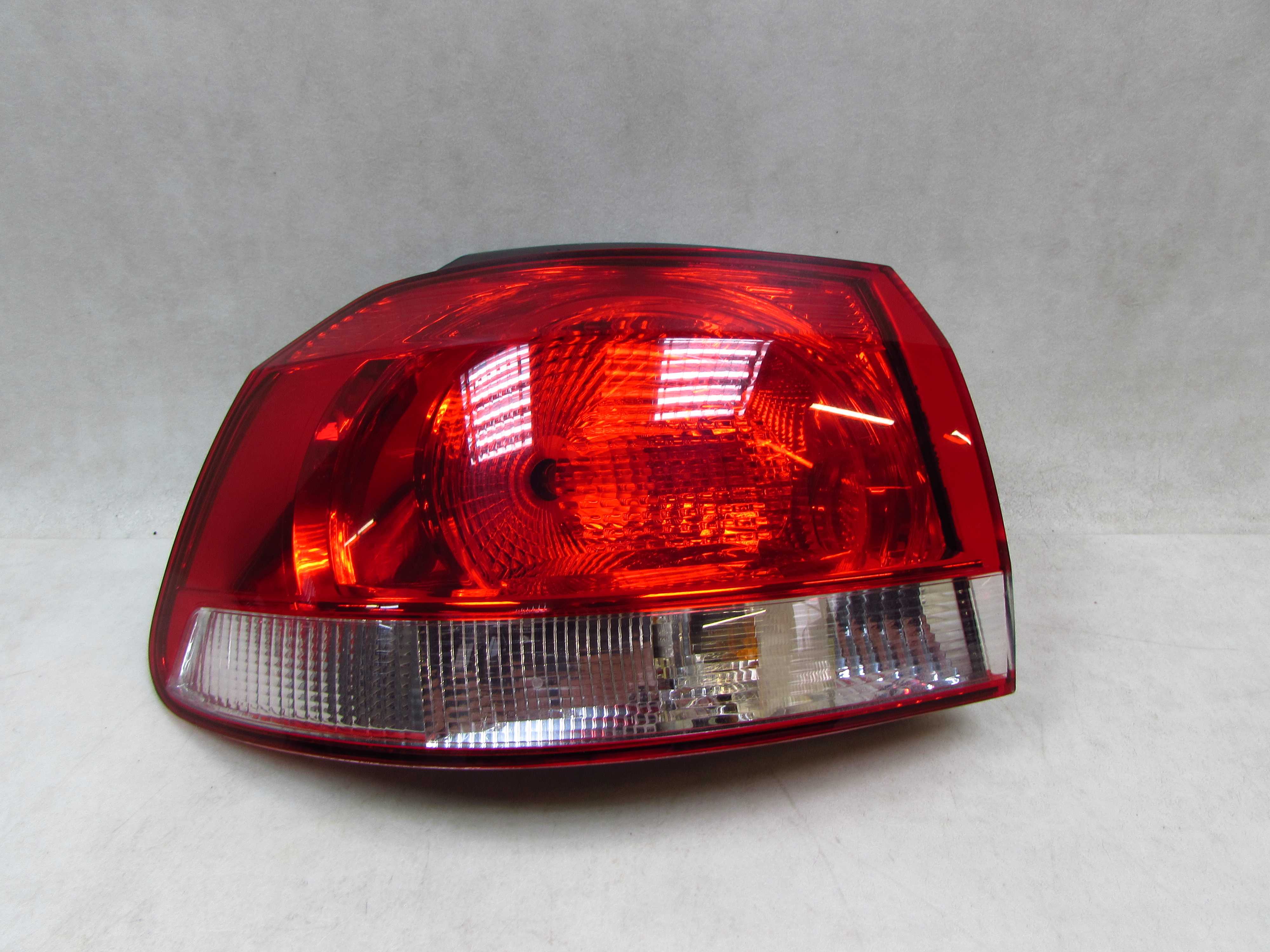 VW GOLF VI HB 08-12 LAMPA TYL LEWA BLOTNIKA 89078560