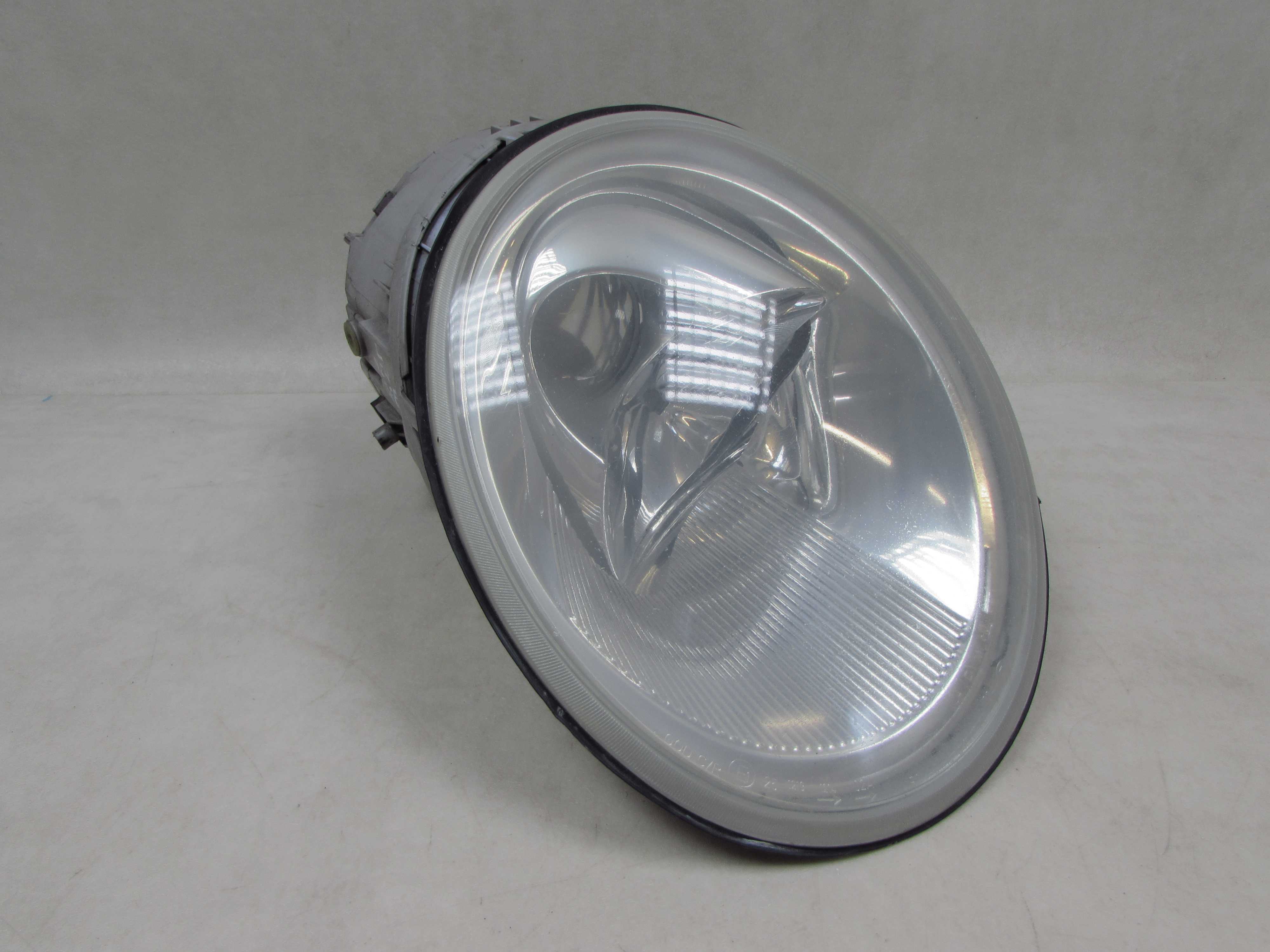 VW NEW BEETLE 97-11 LAMPA PRZOD LEWA REFLEKTOR 1C0941005 EUROPA