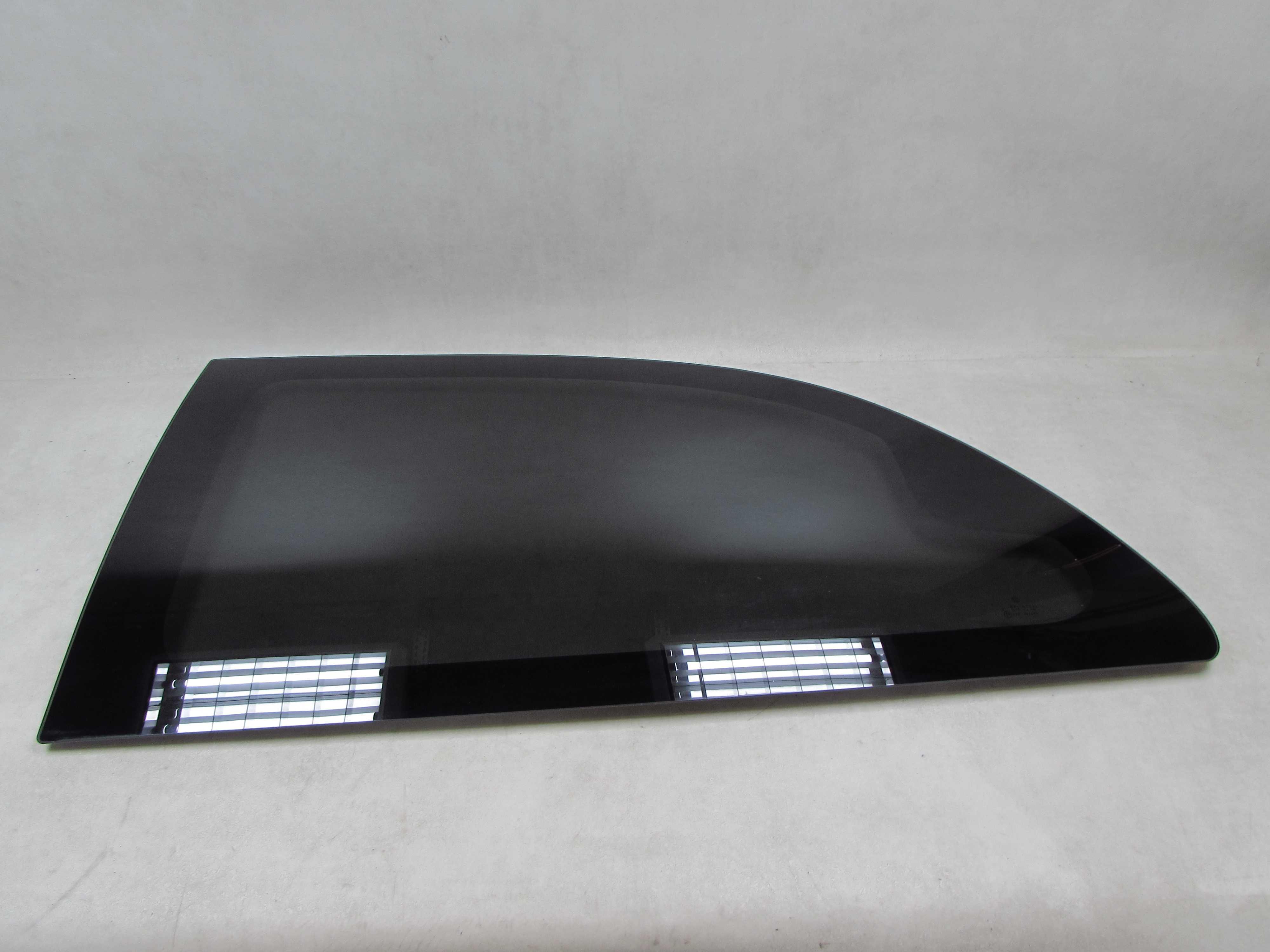 CHRYSLER GRAND VOYAGER DODGE CARAVAN 00-07 SZYBA BOCZNA KAROSERYJNA TYL LEWA
