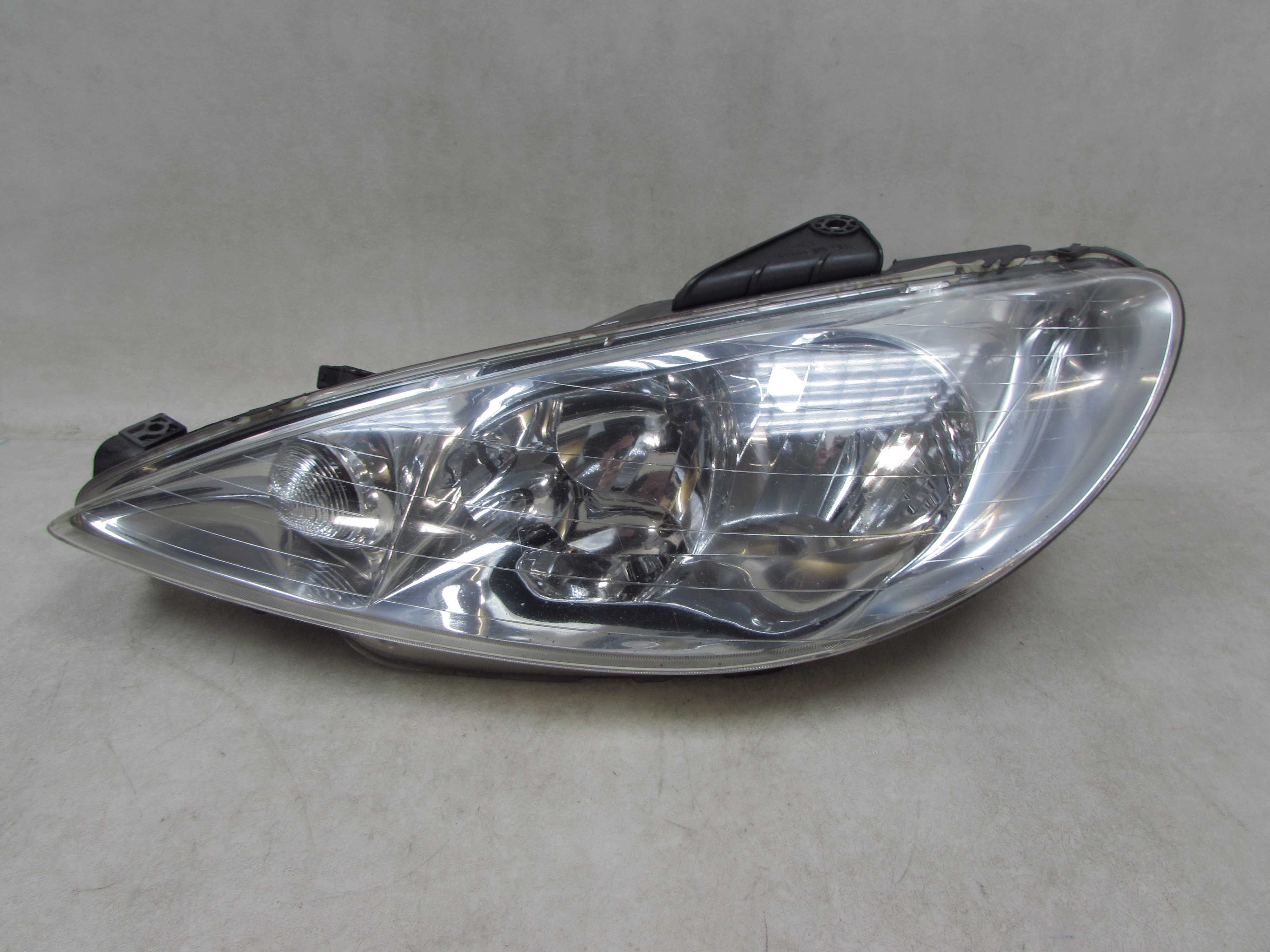 PEUGEOT 206 98-09  LAMPA REFLEKTOR LEWY EU