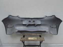 TOYOTA AYGO I LIFT 05-12 ZDERZAK TYL TYLNY 211