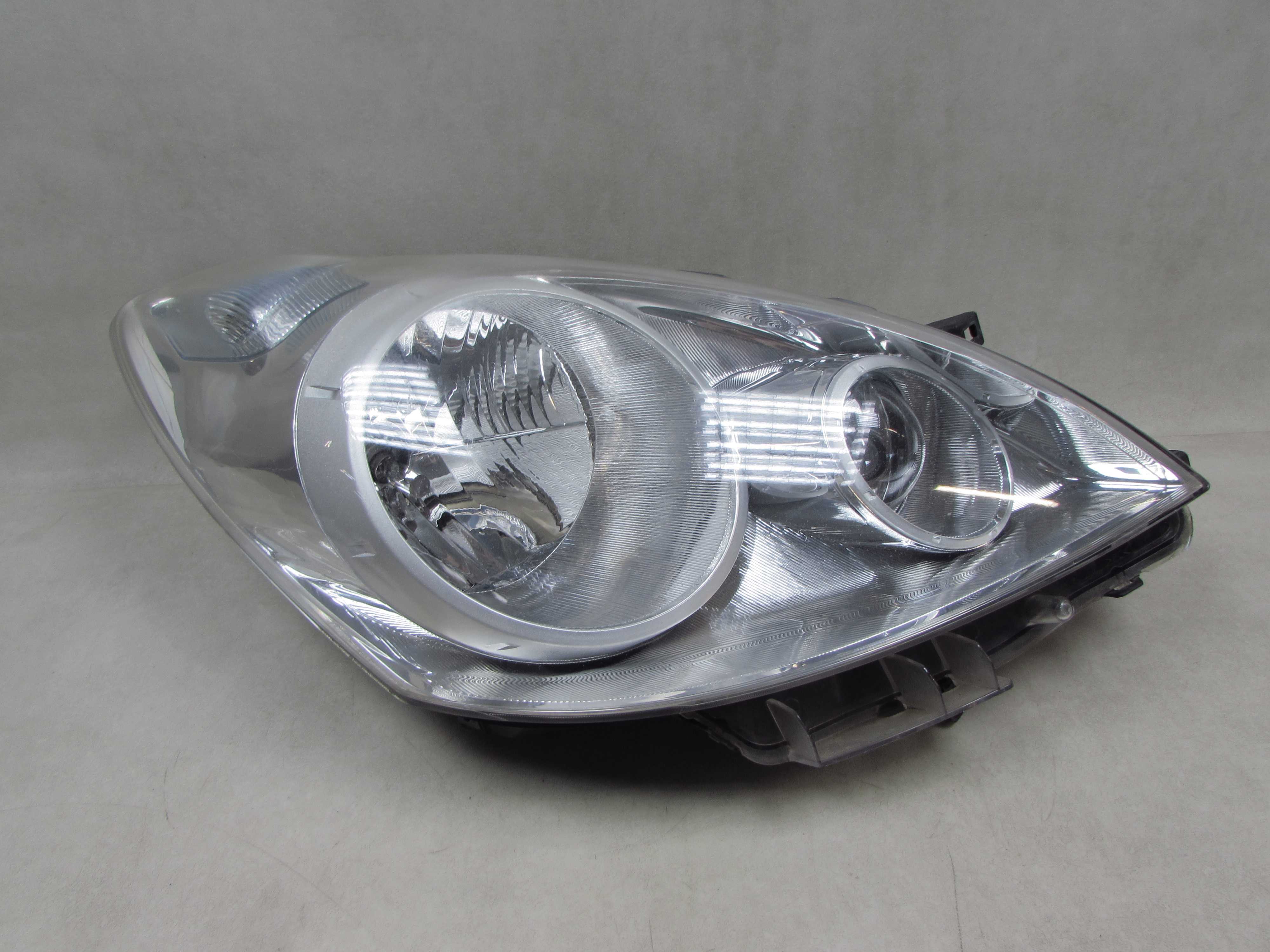 NISSAN NOTE E11 LIFT 09-13 LAMPA PRZOD PRAWA REFLEKTOR 26010BH00A UK
