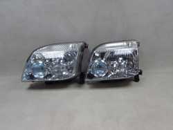NISSAN X-TRAIL T30 LIFT 04-07 LAMPA PRZOD LEWA REFLEKTOR XENON UK