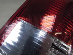 VW TRANSPORTER MULTIVAN T5 LIFT 09-15 LAMPA TYL LEWA DRZWI SKRZYDELKA 7H0945095L