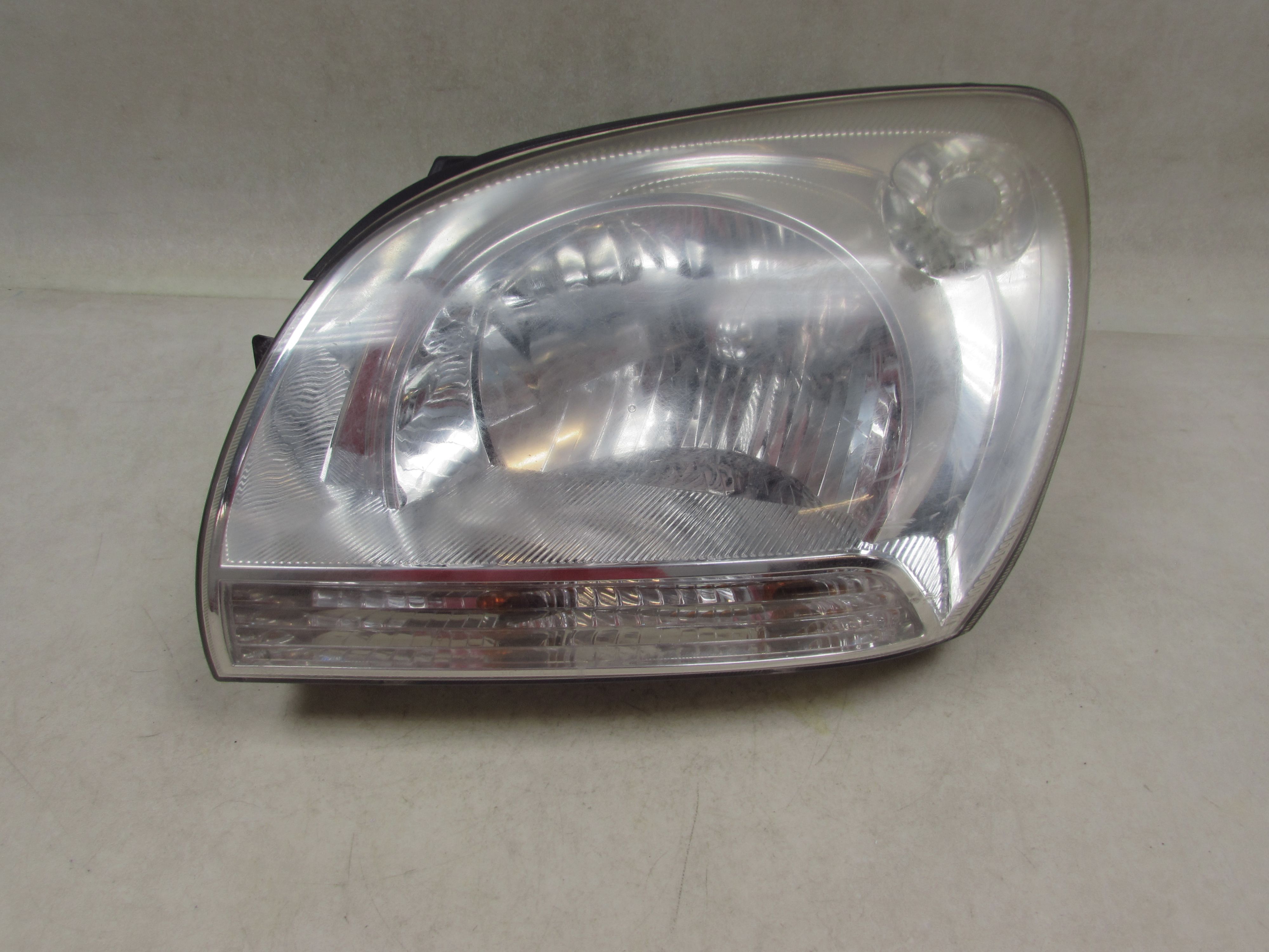 KIA SPORTAGE II 04-10 LAMPA PRZOD LEWA UK 92101-1F0 KIA SPORTAGE II 04-10 LAMPA PRZOD LEWA UK 92101-1F0