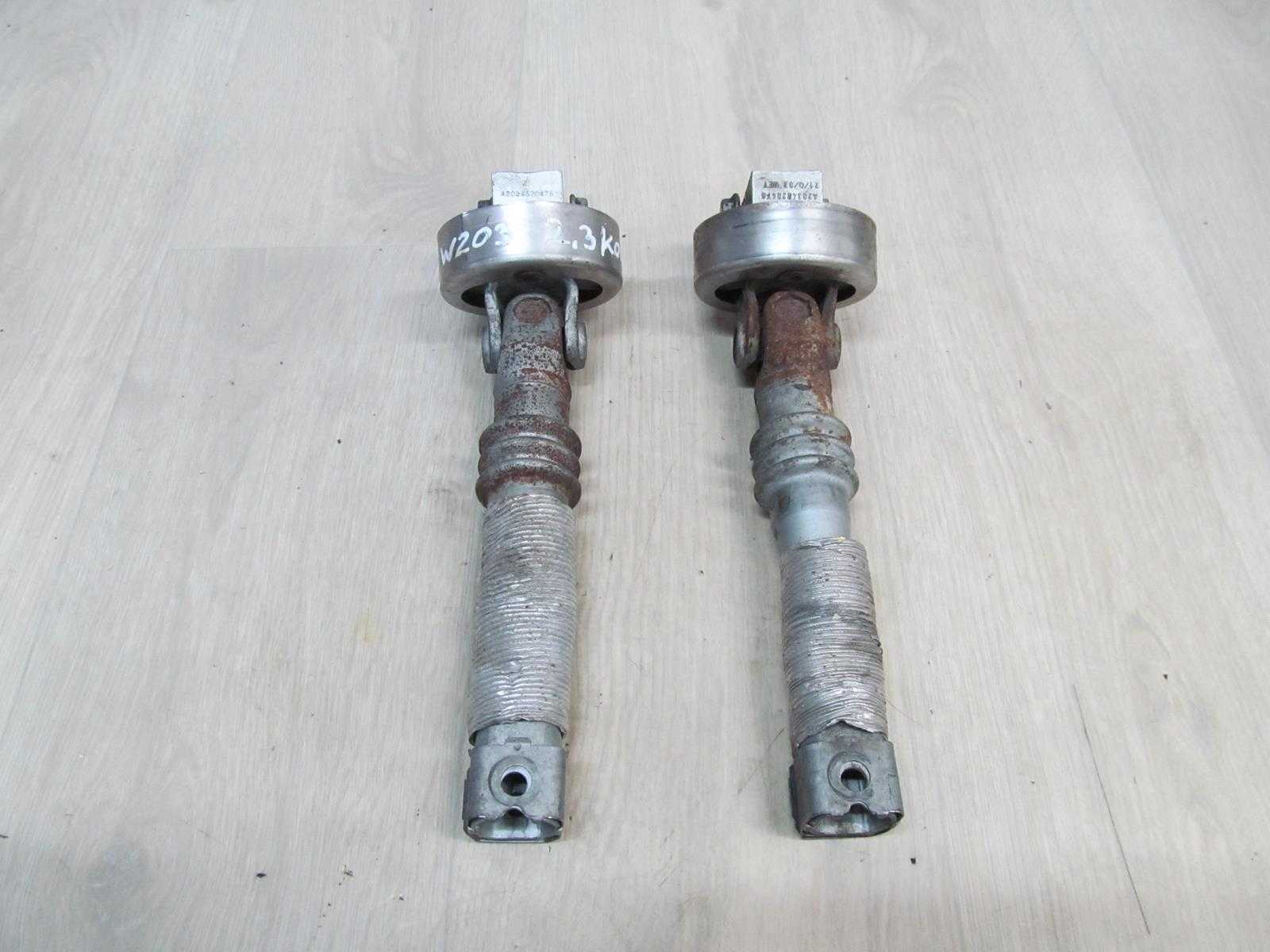 MERCEDES W203 KRZYZAK KOLUMNA KIEROWNICZA A2034620478